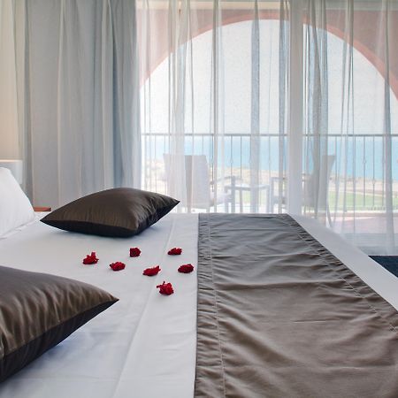 Lighthouse Golf & Spa Hotel Balcsik Kültér fotó A bedroom at the hotel