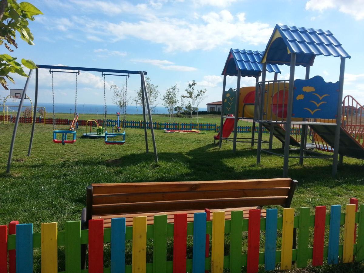 Lighthouse Golf & Spa Hotel Balcsik Kültér fotó Playground in the village